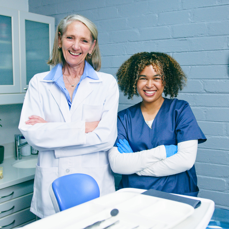 Two Smiling Female Doctors