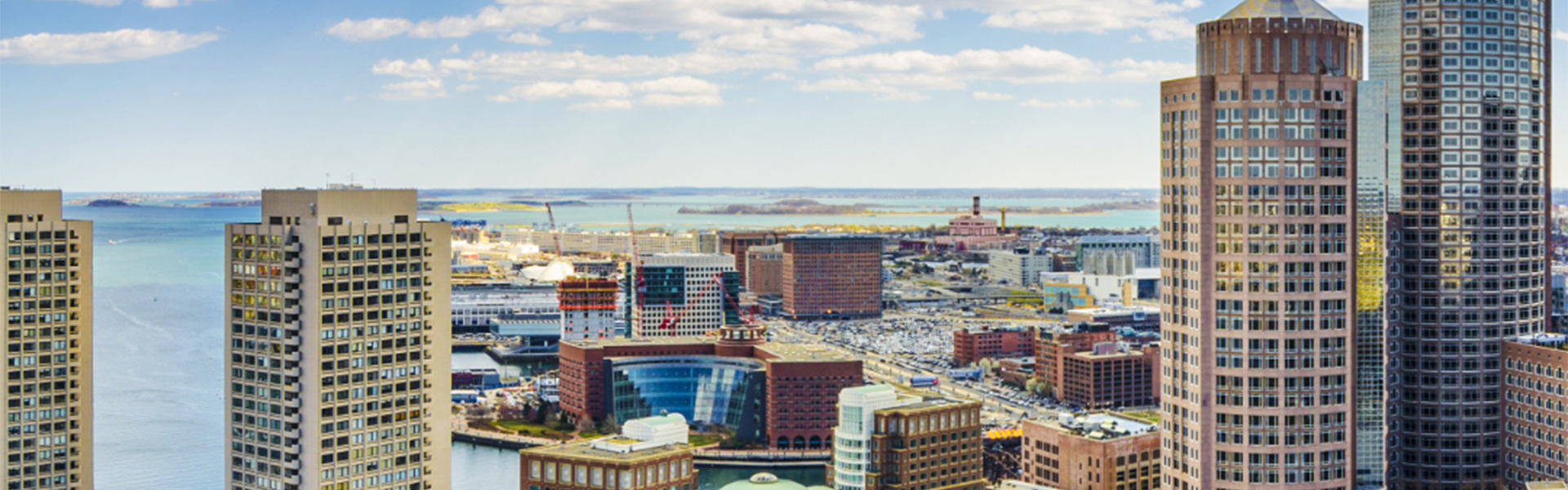 Boston city buildings and coastline during the daytime